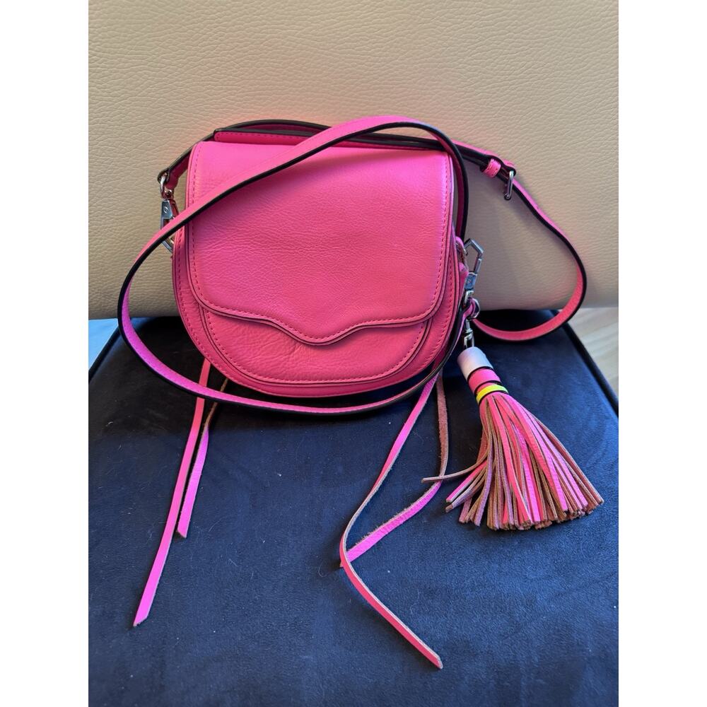 Rebecca Minkoff Mini Suki crossbody bag in a vibrant pink leather